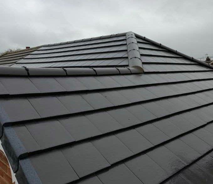 New grey interlocking tiles with a dry ridge